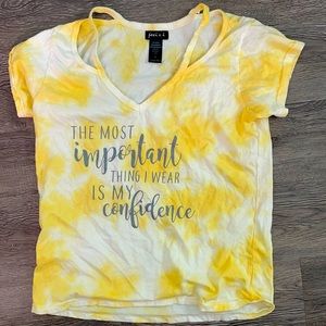 Yellow tye-dye shirt. Inspirational quote.